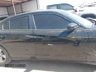 2015 Dodge Charger SXT with VIN 2C3CDXHG5FH928553, listed as a IAAI auction lot 42279342 with 129,402 mi miles and . Bid and sale history available at DreamBid. Image 14.