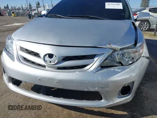 2012 Toyota Corolla L with VIN 2T1BU4EE6CC815435, listed as a IAAI auction lot 41316306 with 122,150 mi miles. Bid and sale history available at carsss.com. Image 6.