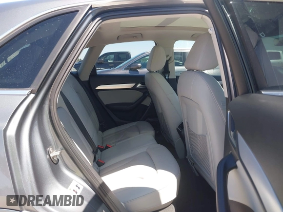 2015 Audi Q3 Prestige with VIN WA1GFCFS7FR013818, listed as a IAAI auction lot 41975076 with 60,295 mi miles and . Bid and sale history available at DreamBid. Image 8.