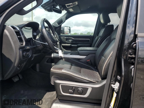 2023 Ram 1500 Laramie with VIN 1C6SRFRT1PN577199, listed as a Copart auction lot 64833895 with 22,119 mi miles and Salvage title. Bid and sale history available at DreamBid. Image 7.