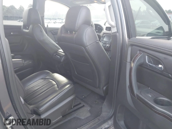 2015 Chevrolet Traverse LTZ with VIN 1GNKVJKDXFJ206159, listed as a IAAI auction lot 41762515 with 143,062 mi miles and . Bid and sale history available at DreamBid. Image 8.