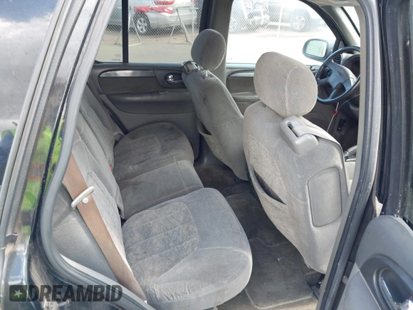 2002 GMC Envoy SLE z VIN 1GKDS13S922523317, wystawiony jako IAAI lot #42374259 z przebiegiem 185 686 mil mil oraz . Historia ofert i sprzedaży dostępna na DreamBid. Obrazek 8.