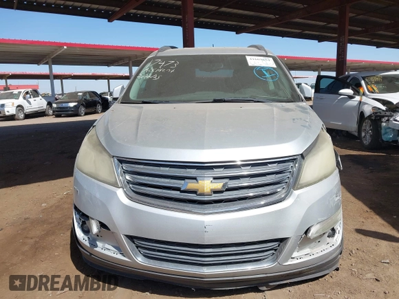 2013 Chevrolet Traverse LT with VIN 1GNKVGKD7DJ198330, listed as a IAAI auction lot 41669654 with 185,602 mi miles and . Bid and sale history available at DreamBid. Image 12.