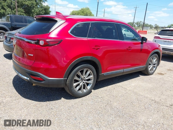 2017 Mazda CX-9 Grand Touring z VIN JM3TCADY3H0140895, wystawiony jako IAAI lot #42817948 z przebiegiem 125 288 mil mil oraz . Historia ofert i sprzedaży dostępna na DreamBid. Obrazek 4.