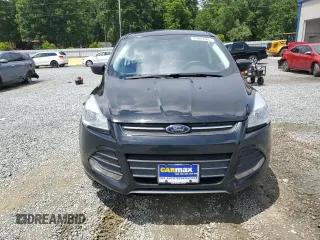 2014 Ford Escape SE with VIN 1FMCU9GX4EUE31879, listed as a Copart auction lot 61907565 with 42,107 mi miles and Salvage title. Bid and sale history available at DreamBid. Image 10.