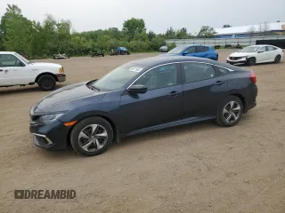 2020 Honda Civic LX z VIN 19XFC2F69LE025564, wystawiony jako Copart lot #60811565 z przebiegiem 12 480 mil mil oraz Szkoda całkowita • Salvage title. Historia ofert i sprzedaży dostępna na DreamBid. Obrazek 1.