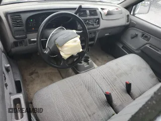 2000 Nissan Frontier XE с VIN 1N6DD21S4YC321371, выставлен на аукционе Copart как лот 55678675 с пробегом 99 775 миль миль и Списание • Salvage title. История ставок и продаж доступна на DreamBid. Изображение 8.
