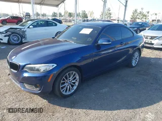 2015 BMW 2 Series 228i xDrive with VIN WBA1F7C5XFV367287, listed as a IAAI auction lot 40802463 with 113,427 mi miles and . Bid and sale history available at carsss.com. Image 2.