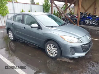 2012 Mazda 3 i Grand Touring z VIN JM1BL1W74C1592446, wystawiony jako IAAI lot #42544314 z przebiegiem 148 379 mil mil oraz . Historia ofert i sprzedaży dostępna na DreamBid. Obrazek 1.
