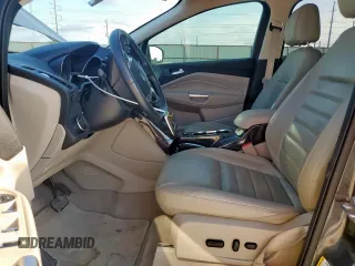 2015 Ford Escape Titanium with VIN 1FMCU0J97FUC88093, listed as a Copart auction lot 60854085 with 64,029 mi miles and Salvage title. Bid and sale history available at DreamBid. Image 7.