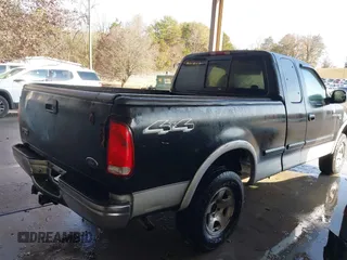2000 Ford F-150 XL with VIN 1FTRX18LXYNA19385, listed as a IAAI auction lot 41075391 with 214,624 mi miles and . Bid and sale history available at DreamBid. Image 4.