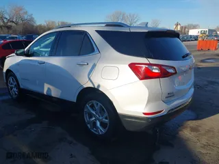 2018 Chevrolet Equinox Premier with VIN 2GNAXVEVXJ6324008, listed as a IAAI auction lot 41877394 with 106,729 mi miles. Bid and sale history available at carsss.com. Image 3.