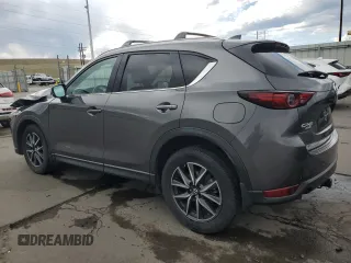 2017 Mazda CX-5 Grand Touring with VIN JM3KFBDL4H0163339, listed as a Copart auction lot 50566495 with 83,453 mi miles and Salvage Title. Bid and sale history available at carsss.com. Image 2.
