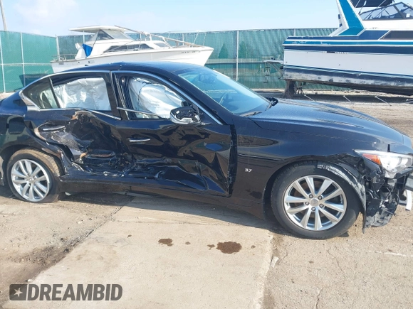 2014 Infiniti Q50 Sport with VIN JN1BV7AR2EM705059, listed as a IAAI auction lot 42019066 with 61,012 mi miles and . Bid and sale history available at carsss.com. Image 6.