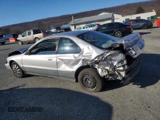 1997 Honda Accord LX with VIN 1HGCD723XVA033754, listed as a Copart auction lot 85194774 with 77,269 mi miles and Salvage Title. Bid and sale history available at carsss.com. Image 2.