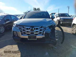 2024 Hyundai Santa Cruz SEL z VIN 5NTJC4AE3RH099170, wystawiony jako IAAI lot #41285989 z przebiegiem 38 112 mil mil oraz . Historia ofert i sprzedaży dostępna na DreamBid. Obrazek 6.