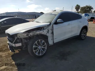 2015 BMW X6 sDrive35i with VIN 5UXKU0C5XF0F92120, listed as a Copart auction lot 58244044 with 157,311 mi miles and Salvage Title. Bid and sale history available at carsss.com. Image 1.