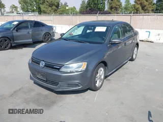 2013 Volkswagen Jetta Hybrid SE with VIN 3VW637AJ3DM305798, listed as a IAAI auction lot 42736297 with 156,972 mi miles and . Bid and sale history available at DreamBid. Image 6.