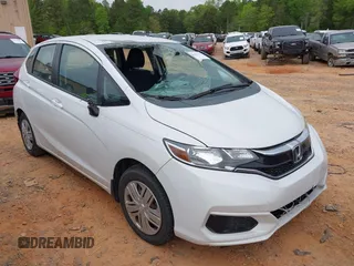 2019 Honda Fit LX z VIN 3HGGK5H4XKM704303, wystawiony jako IAAI lot #42019753 z przebiegiem 137 271 mil mil oraz . Historia ofert i sprzedaży dostępna na DreamBid. Obrazek 1.