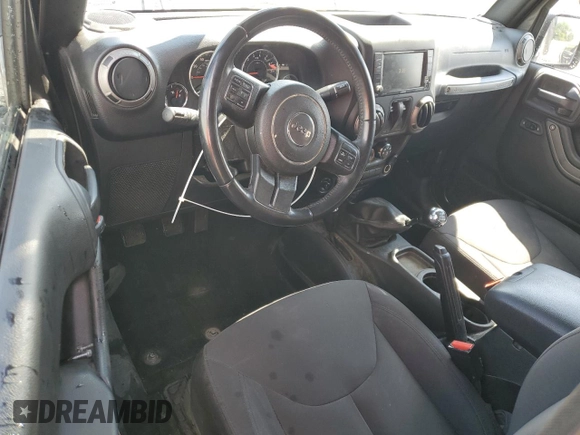 2017 Jeep Wrangler Willys Wheeler with VIN 1C4AJWAG2HL527192, listed as a Copart auction lot 58169245 with 88,737 mi miles and Salvage title. Bid and sale history available at DreamBid. Image 8.
