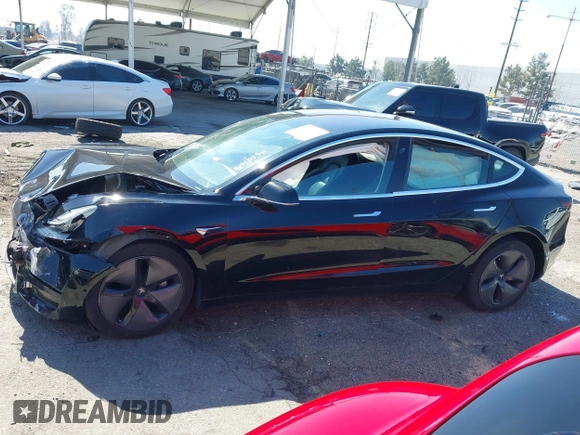 2018 Tesla Model 3 Long Range Battery with VIN 5YJ3E1EB9JF183920, listed as a IAAI auction lot 41657742 with 107,358 mi miles and . Bid and sale history available at DreamBid. Image 13.
