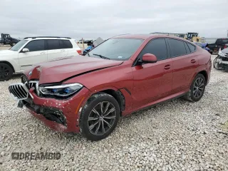 2021 BMW X6 sDrive40i z VIN 5UXCY4C01M9G08122, wystawiony jako Copart lot #44947865 z przebiegiem 90 011 mil mil oraz Szkody całkowita. Historia ofert i sprzedaży dostępna na DreamBid. Obrazek 1.