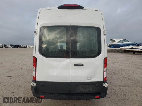 2019 Ford Transit with VIN 1FTYR3XM0KKA68129, listed as a Copart auction lot 89016935 with 82,082 mi miles and Salvage title. Bid and sale history available at DreamBid. Image 6.