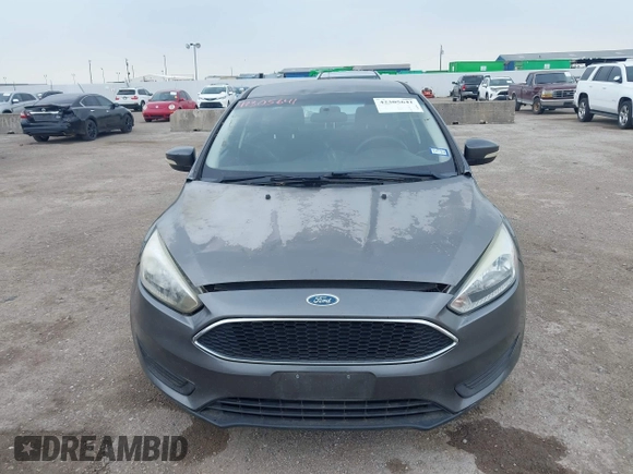 2017 Ford Focus SE z VIN 1FADP3F21HL205009, wystawiony jako IAAI lot #42305641 z przebiegiem 75 160 mil mil oraz . Historia ofert i sprzedaży dostępna na DreamBid. Obrazek 6.