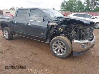 2018 GMC Sierra 1500 SLT with VIN 3GTP1NEC1JG449938, listed as a IAAI auction lot 42106470 with 106,571 mi miles and . Bid and sale history available at DreamBid. Image 1.