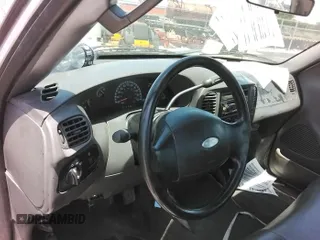 2003 Ford F-150 XL with VIN 1FTRF17W83NA88003, listed as a IAAI auction lot 42345784 with Not provided miles and . Bid and sale history available at DreamBid. Image 1.