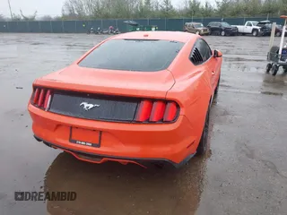 2016 Ford Mustang EcoBoost with VIN 1FA6P8TH8G5266228, listed as a IAAI auction lot 41823278 with 104,595 mi miles and . Bid and sale history available at DreamBid. Image 4.