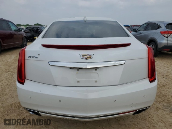 2016 Cadillac XTS Luxury Collection with VIN 2G61M5S38G9108012, listed as a Copart auction lot 51249905 with 135,467 mi miles and Salvage title. Bid and sale history available at DreamBid. Image 6.