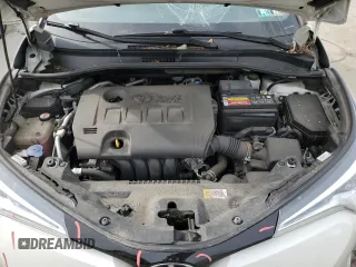 2019 Toyota C-HR XLE z VIN NMTKHMBX7KR073500, wystawiony jako Copart lot #53596395 z przebiegiem 91 934 mil mil oraz Szkoda całkowita • Salvage title. Historia ofert i sprzedaży dostępna na DreamBid. Obrazek 12.