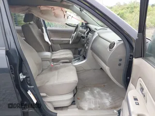 2012 Suzuki Grand Vitara Premium z VIN JS3TD0D6XC4100539, wystawiony jako IAAI lot #42384659 z przebiegiem 143 711 mil mil oraz . Historia ofert i sprzedaży dostępna na DreamBid. Obrazek 5.