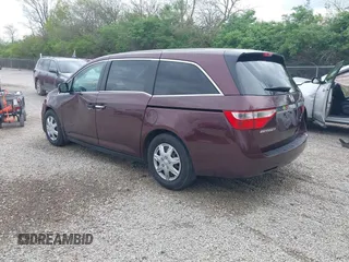 2013 Honda Odyssey LX with VIN 5FNRL5H25DB080209, listed as a IAAI auction lot 42123644 with 157,631 mi miles and . Bid and sale history available at carsss.com. Image 3.