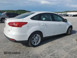 2015 Ford Focus SE with VIN 1FADP3F2XFL220072, listed as a Copart auction lot 58058255 with 128,871 mi miles and Clean title. Bid and sale history available at DreamBid. Image 3.