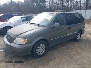 2004 Kia Sedona LX with VIN KNDUP131546543841, listed as a IAAI auction lot 41541012 with 112,122 mi miles. Bid and sale history available at carsss.com. Image 17.
