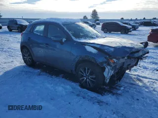 2018 Mazda CX-3 Touring with VIN JM1DKFC75J0309438, listed as a Copart auction lot 44071705 with 121,057 mi miles and Salvage Title. Bid and sale history available at carsss.com. Image 4.