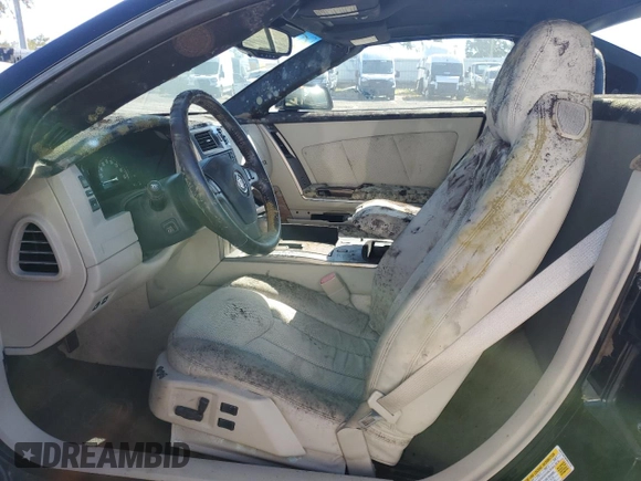 2006 Cadillac XLR z VIN 1G6YX36D965602114, wystawiony jako Copart lot #80151794 z przebiegiem Nie podano mil oraz Szkoda całkowita • Salvage title. Historia ofert i sprzedaży dostępna na DreamBid. Obrazek 7.