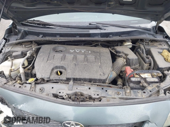 2009 Toyota Corolla with VIN 1NXBU40E49ZO81912, listed as a IAAI auction lot 41806599 with 216,989 mi miles. Bid and sale history available at carsss.com. Image 10.
