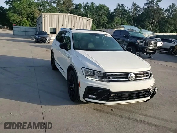 2021 Volkswagen Tiguan SE z VIN 3VV3B7AX5MM136155, wystawiony jako Copart lot #56120395 z przebiegiem 59 421 mil mil oraz Szkoda całkowita • Salvage title. Historia ofert i sprzedaży dostępna na DreamBid. Obrazek 14.