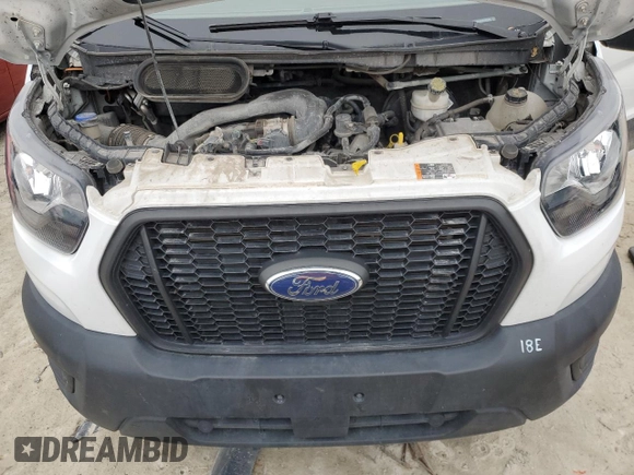 2023 Ford Transit Cargo z VIN 1FTBR1X83PKB01645, wystawiony jako Copart lot #88056705 z przebiegiem 52 948 mil mil oraz Czysty tytuł • Clean title. Historia ofert i sprzedaży dostępna na DreamBid. Obrazek 12.