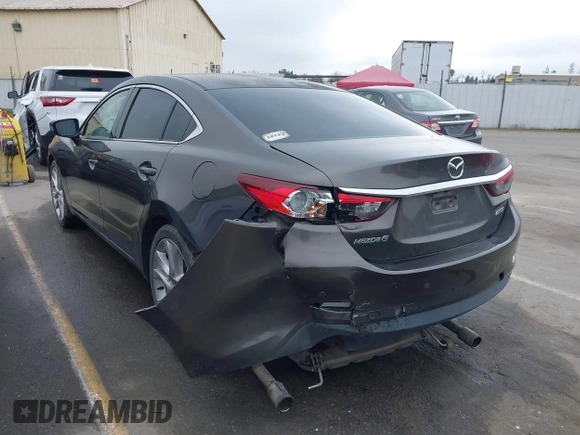 2016 Mazda 6 i Touring with VIN JM1GJ1V52G1473330, listed as a IAAI auction lot 41657684 with 138,064 mi miles and . Bid and sale history available at DreamBid. Image 3.