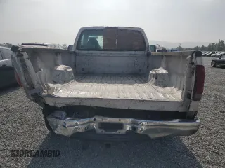1999 Ford F-250 XL с VIN 1FTNF20L3XEA99923, выставлен на аукционе Copart как лот 58765435 с пробегом 559 043 миль миль и Списание • Salvage title. История ставок и продаж доступна на DreamBid. Изображение 6.