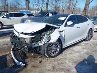 2016 Kia Optima SXL Turbo with VIN 5XXGV4L23GG073151, listed as a IAAI auction lot 41363341 with 74,226 mi miles. Bid and sale history available at carsss.com. Image 6.