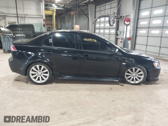 2011 Mitsubishi Lancer GTS with VIN JA32U8FW7BU034390, listed as a IAAI auction lot 41643536 with 130,319 mi miles and . Bid and sale history available at carsss.com. Image 13.