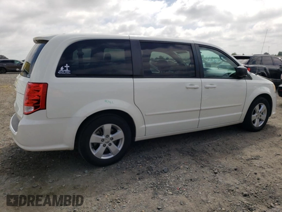 2013 Dodge Grand Caravan SE with VIN 2C4RDGBG3DR560962, listed as a Copart auction lot 53690225 with 124,796 mi miles and Salvage Title. Bid and sale history available at DreamBid. Image 3.