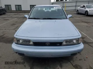 1990 Toyota Camry z VIN JT2VV22EXL3011563, wystawiony jako Copart lot #46136565 z przebiegiem 63 819 mil mil oraz Czysty tytuł • Clean title. Historia ofert i sprzedaży dostępna na DreamBid. Obrazek 5.