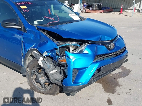 2017 Toyota RAV4 LE with VIN JTMZFREV4HJ115558, listed as a IAAI auction lot 41999381 with 94,223 mi miles and . Bid and sale history available at carsss.com. Image 6.