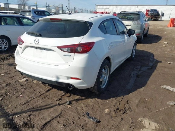 2018 Mazda Mazda3 5-Door Touring with VIN 3MZBN1L39JM203969, listed as a IAAI auction lot 41779693 with 73,548 mi miles. Bid and sale history available at carsss.com. Image 4.